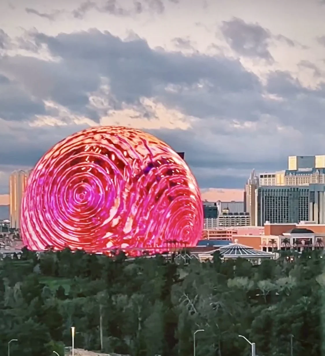 The Las Vegas Sphere popping with color against the downtown backdrop. Its a must see on your next trip to Las Vegas.