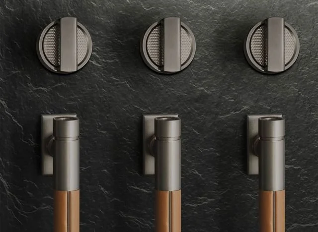   THE TITANIUM COLLECTION   The Titanium Collection presents a contemporary luxury aesthetic rooted in the art of reductionism, with sleek lines and dark-charcoal muted tones. 
